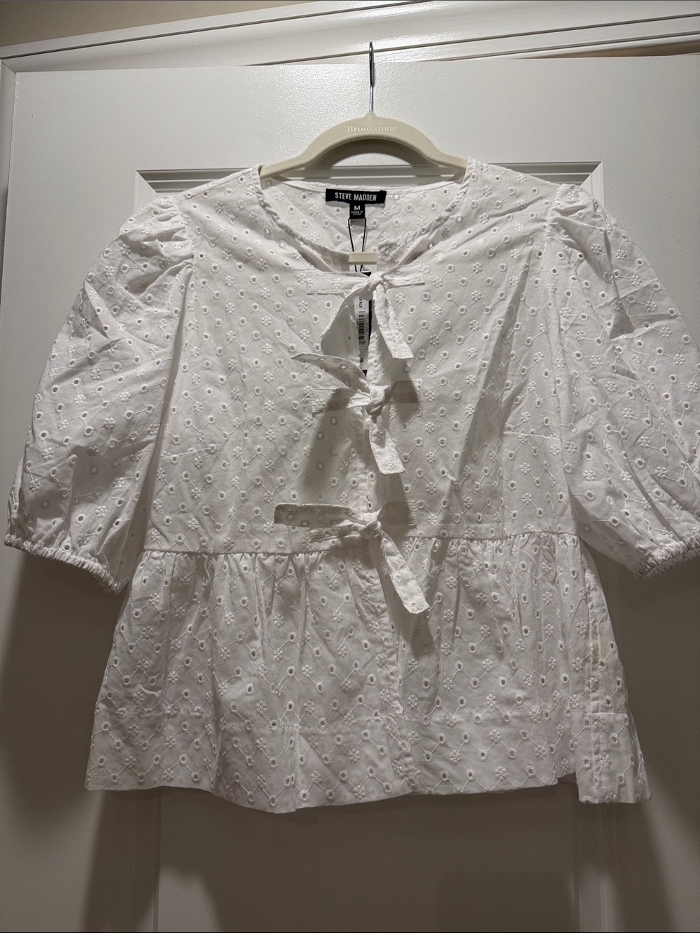 STEVE MADDEN Eyelet Tie Front Peplum Top